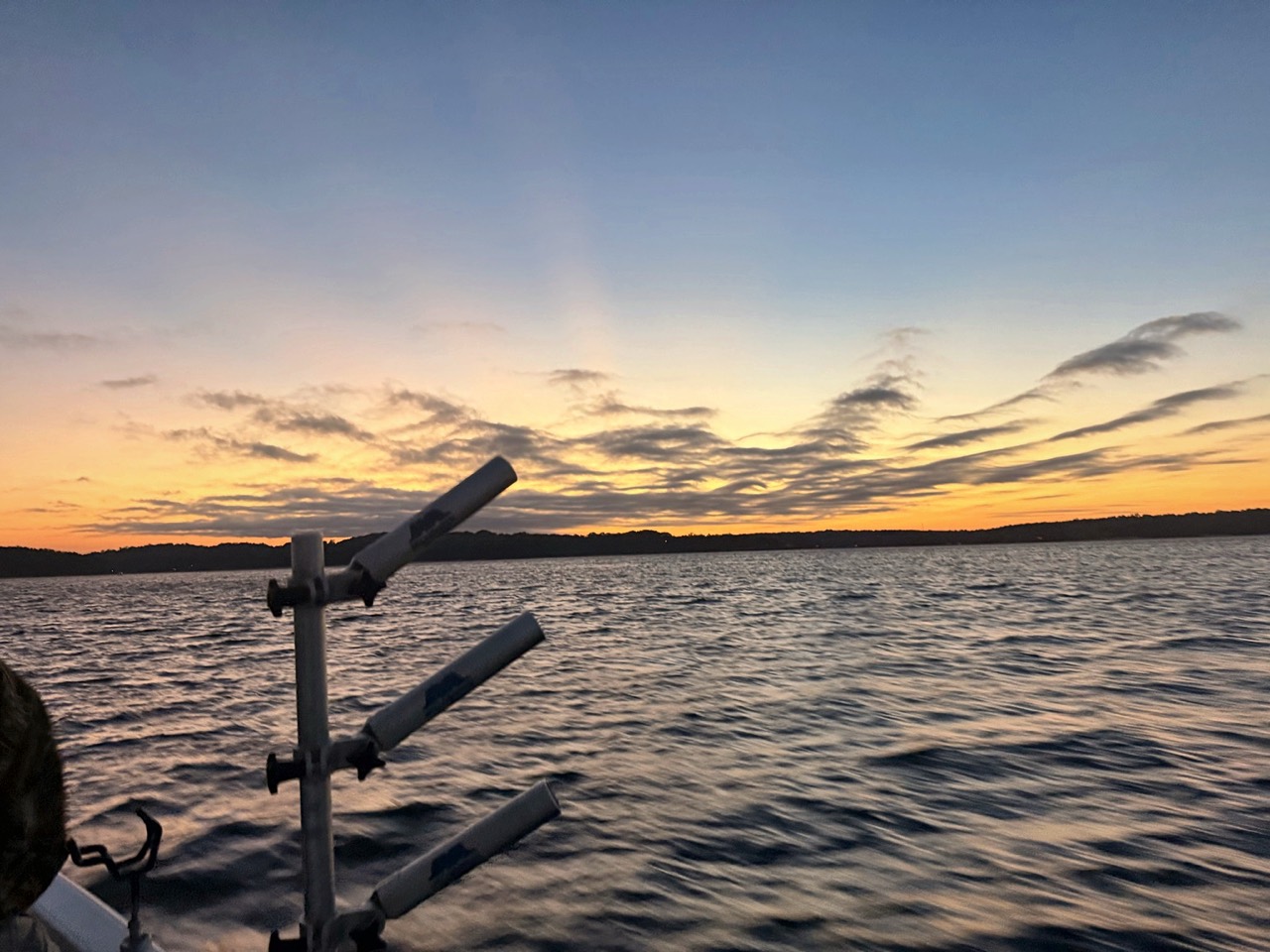Lake Lanier Striper Fishing Report – October 24, 2026 | Tough Conditions, Quality Fish & Fall Migration Windy Lake Lanier at sunrise during the October fall transition